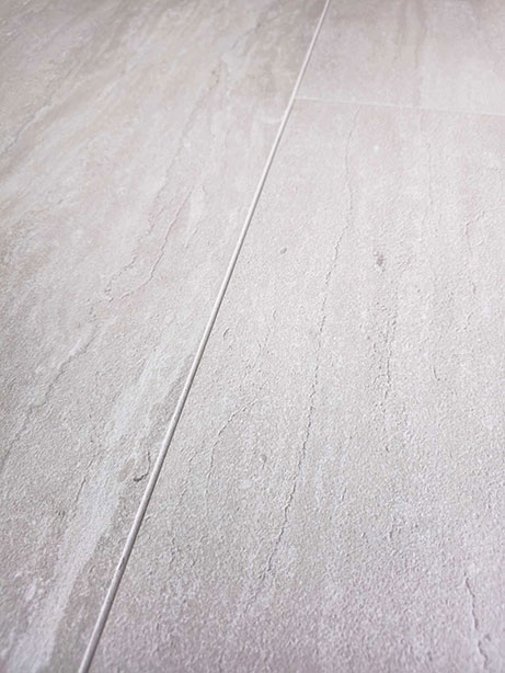 Close-up van keramische tegels met marmerlook